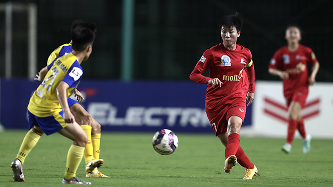 Tuyết Dung cùng đồng đội ở Phong Phú Hà Nam đã chặn đứng đà thắng trận của Thái Nguyên T&T chiều 15-9. Ảnh: AH